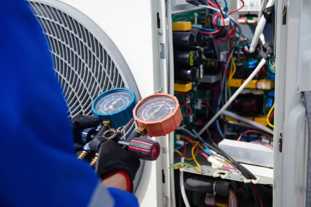 Ac Technician Repairing split air conditioning unit in home